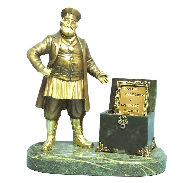 Статуэтка бронзовая "Купец с сундуком"