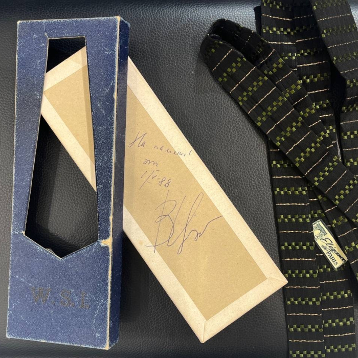 A tie with an inscription and an autograph of the musician Viktor Tsoi