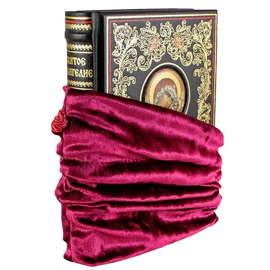 The leather-bound book "The Holy Gospel"
